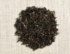 Darjeeling Steinthal musta luomutee. Lähikuva lehdistä. 